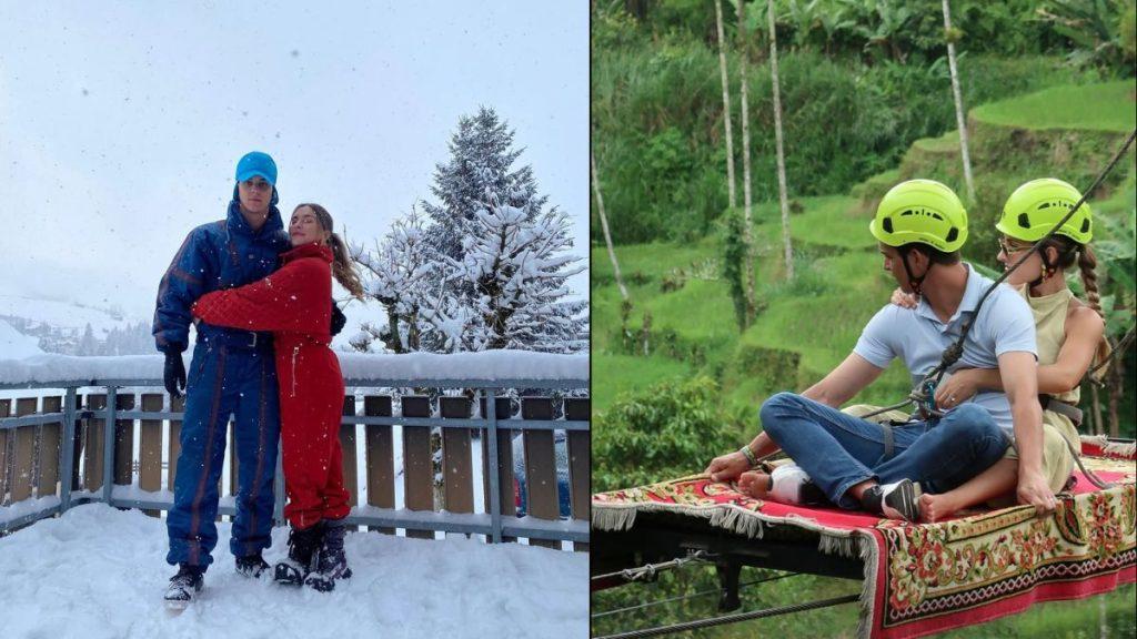 Couple in Snowsuits Embrace on a Snowy Balcony; on the Right, Two Riders in Neon Helmets Sit on a Rug-covered Zip-line Platform. | La Silla Regia