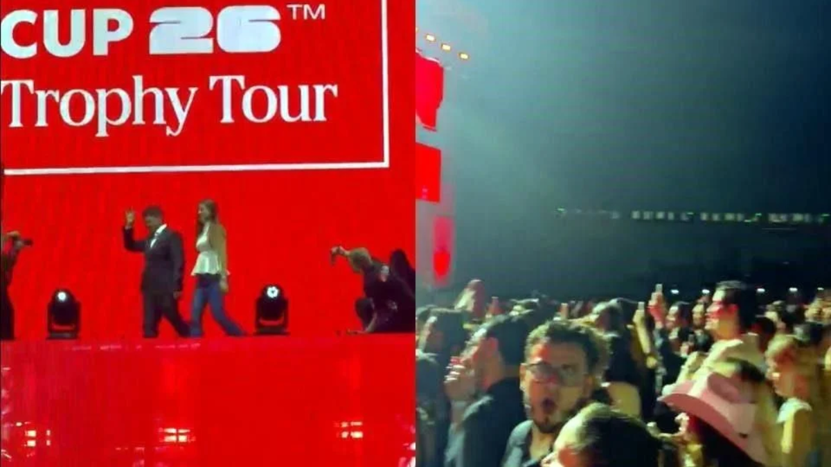 Stage with a Red Backdrop Reading 'cup 26 Trophy Tour' As Hosts Wave to the Audience on a Lit Platform, with a Cheering Crowd in Front. | La Silla Regia